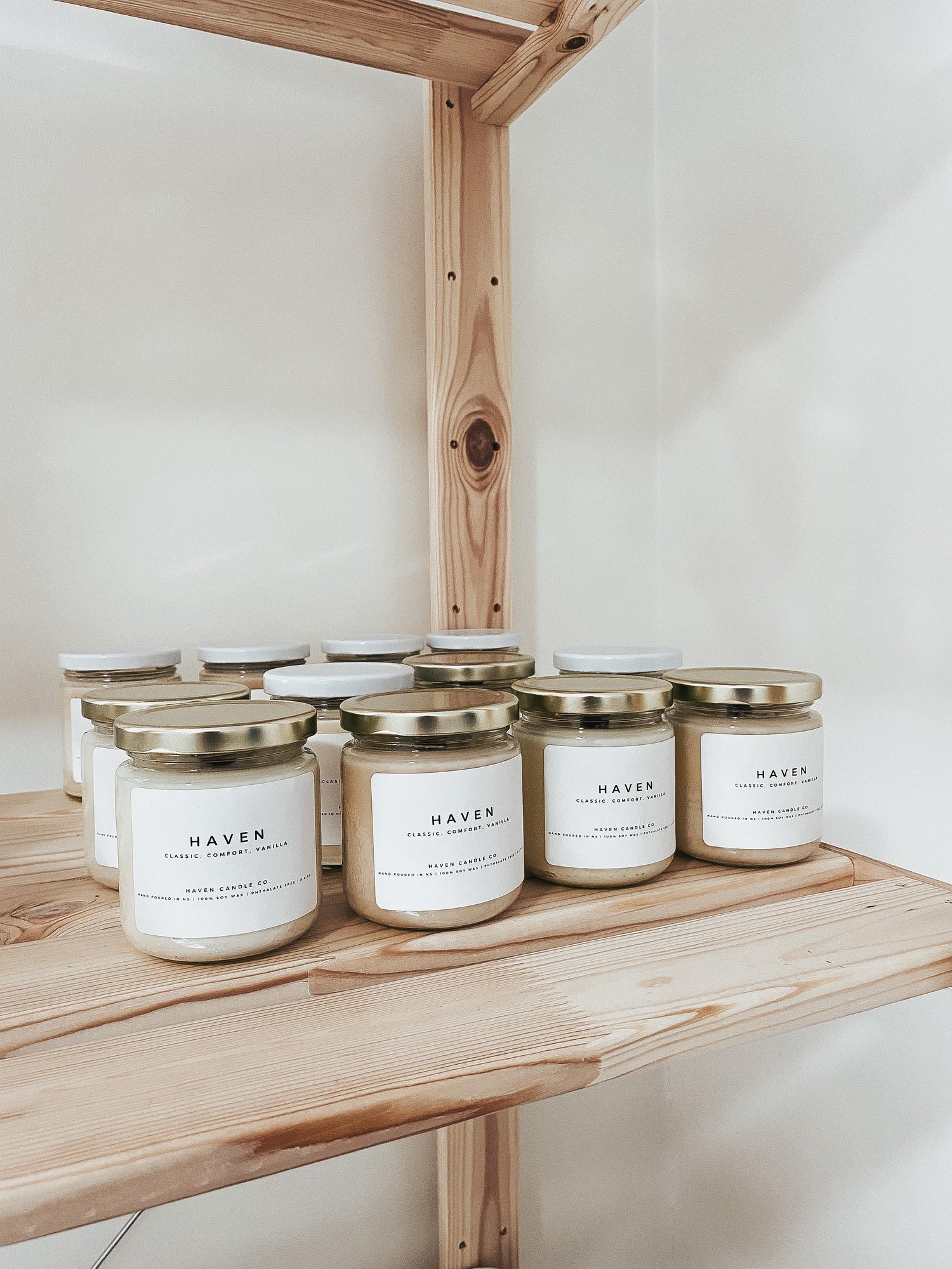 soy wax candles poured by haven candle co in nova scotia, placed on shelf
